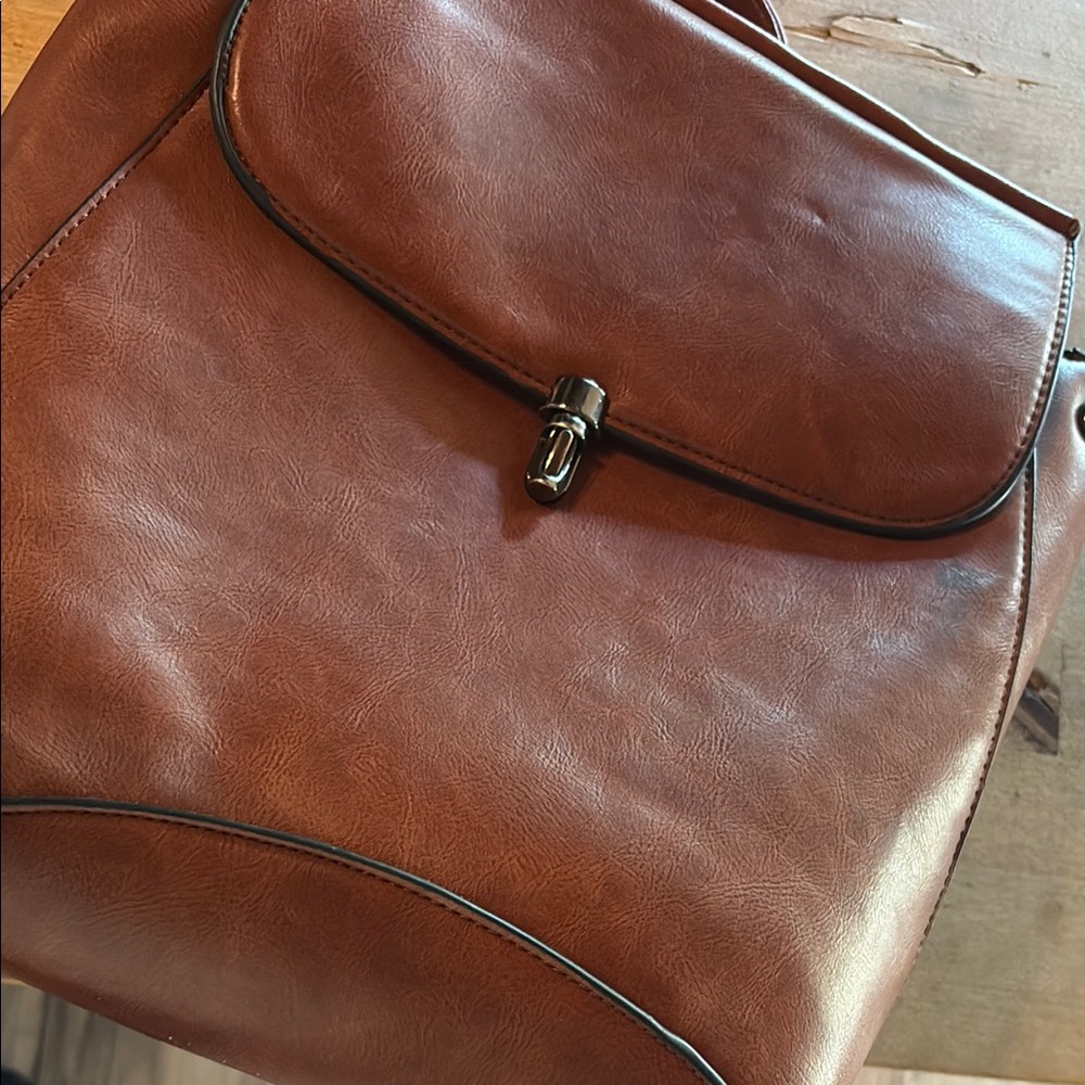 Brown Leather Backpack With Flap Closure - image 3